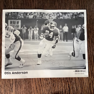otis anderson NFL New York Giants signed black white photo 8 x 10/sports collectibles