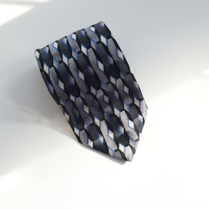 1990s Ziggurat Gray, Black, And Blue Patterned Silk Necktie