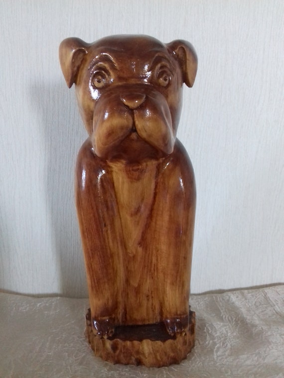 carved wooden dog