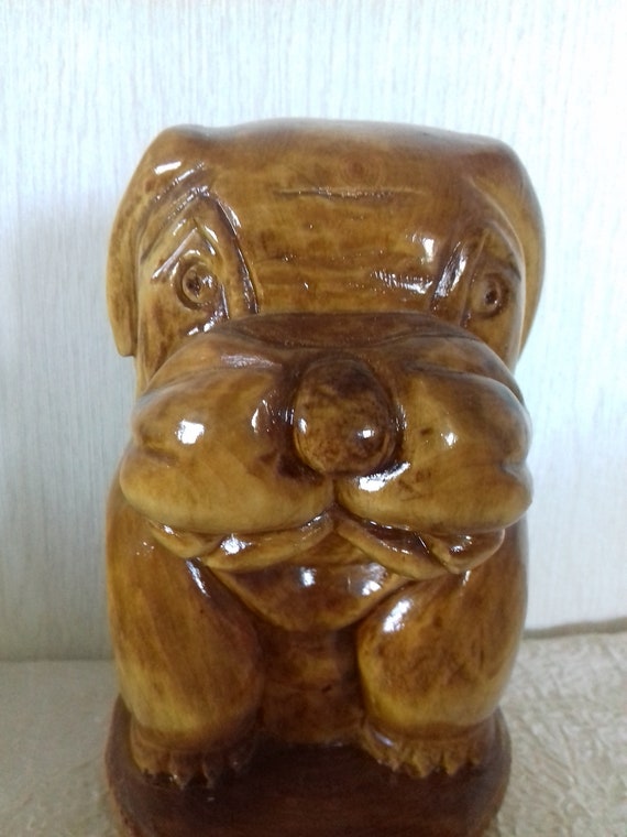 carved wooden dog