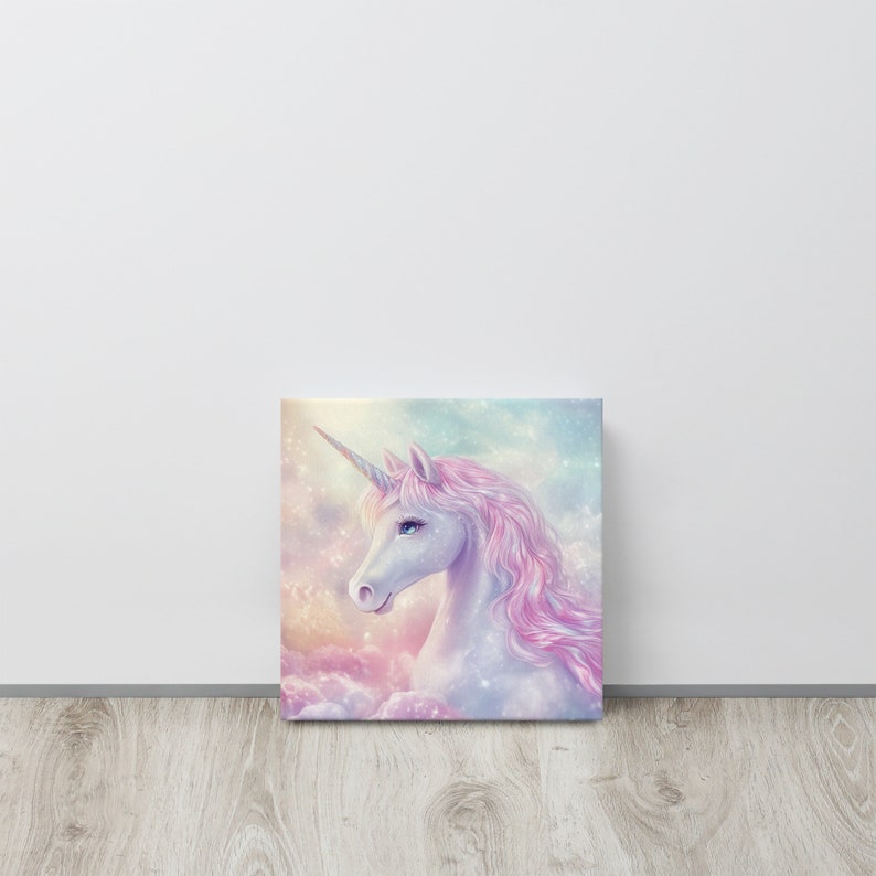 May include: A canvas print featuring a majestic unicorn with a white body, a spiraled horn, and flowing pink mane. The unicorn is set against a dreamy backdrop of pastel clouds and a soft, glowing sky. The artwork evokes a sense of fantasy and wonder.