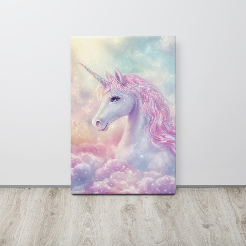 May include: Canvas art print of a unicorn. The unicorn has a white body, pink mane, and a spiraled horn. It is set against a backdrop of pastel clouds and a starry sky. The artwork is mounted on a wooden frame.