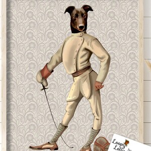 May include: Framed print of a dog-headed figure in fencing gear. The dog has brown and black fur, and the fencing outfit is cream with brown details. The background features a floral pattern. The print is by Loopy Lolly by FabFunky.