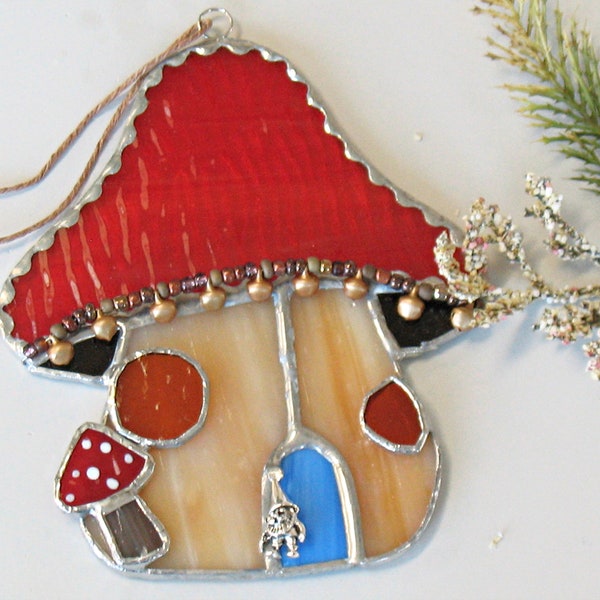 Mushroom with gnome in stained glass, suncatcher window hanging and is home to a little gnome.  Toadstool gift for friend, wall decor.