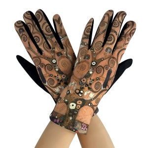 May include: A pair of brown and black gloves with a swirling pattern. The pattern is reminiscent of a tree of life design.
