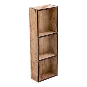 May include: A wooden shelf unit with three shelves. The shelves are made of light brown wood with a dark brown stain. The shelf unit is freestanding and has a rectangular shape.