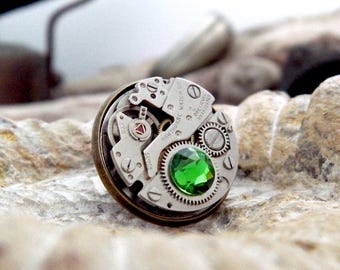 Steampunk Lapel Pin Badge with Watch Mechanics. Vintage Watch Movement & Green Crystal. Antique Bronze Colour Backing. Retirement Gift
