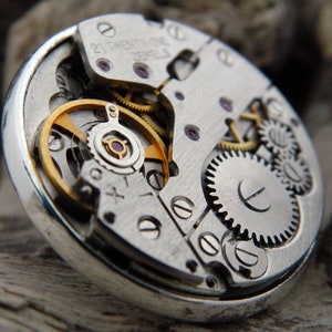 Steampunk Lapel Pin Badge, With Watch Mechanics. Vintage Watch Movement & Silver Plated Backing. image 1