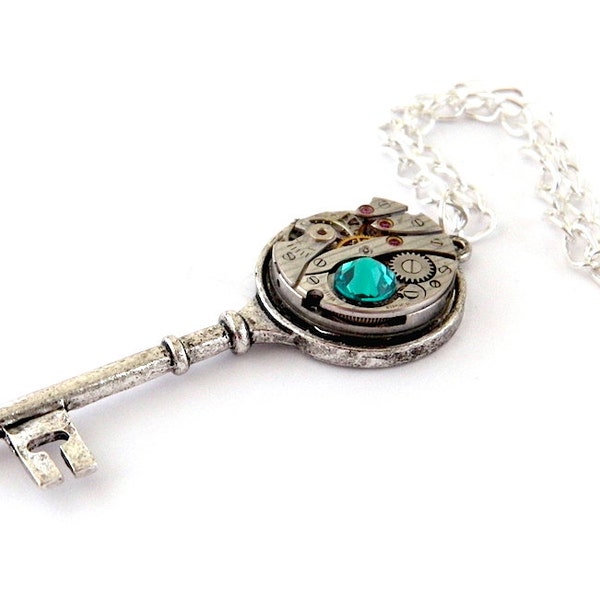 Steampunk Key Necklace / Pendant. Vintage Watch Movement & Blue Zircon Crystal.