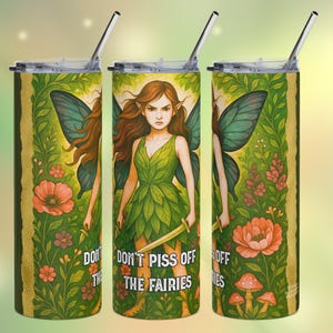 May include: A set of three stainless steel tumblers with lids and straws. Each tumbler features a watercolor illustration of a fairy with green wings and a leaf-like dress, holding a sword. The text "DON'T PISS OFF THE FAIRIES" is printed on the center tumbler.