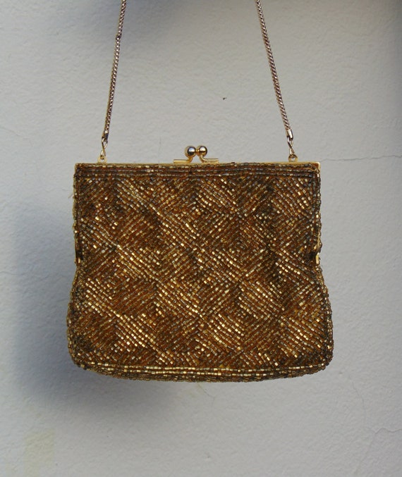 small gold clutch bag