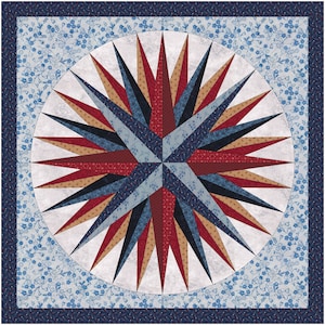 Op de afbeelding: Een quiltblok met een stervormig ontwerp in tinten rood, blauw en bruin. De ster is omgeven door een witte achtergrond met een blauw bloemenpatroon.
