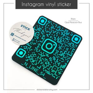 May include: Black vinyl sticker with a blue and green Instagram QR code. The text "_N_LINE_54_" is printed below the QR code. The sticker is available in black, opal, peacock, and blue.