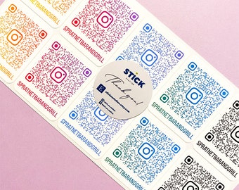 May include: A set of colorful square stickers with a QR code and the text "SPRATNETBARANDGRILL" on each sticker. A round sticker with the text "STICK STATION" and "Thank you!" is in the center of the image.