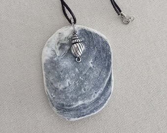 maritime oyster shell with anchor pendant on waxed cotton cord