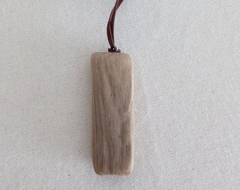 Pendant made of driftwood, necklace