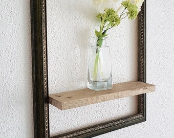 Wall shelf in antique frame