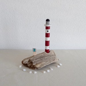 Lighthouse from & on a driftwood