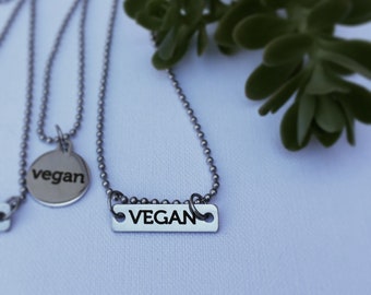 stainless steel 'vegan' charm necklace.