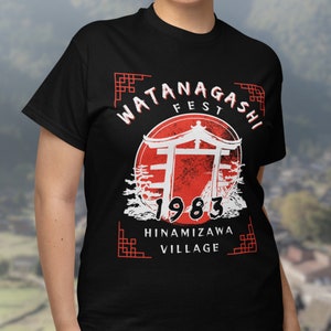May include: Black t-shirt with a white graphic design featuring a red circle with a Japanese temple gate, the text "Watagashi Fest 1983 Hinamizawa Village", and a red and white border.