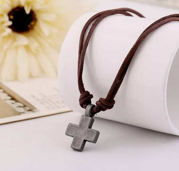 Cross on leather cord necklace outlet