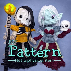 May include: Two crocheted dolls, one with a skull face and staff, the other with pale skin and a skull. The dolls are wearing detailed costumes in black, yellow, red, and gray. Text on the image reads "PDF Pattern - Not a physical item."