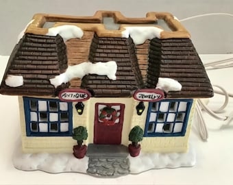 St. Nicholas Square Clock Tower: Lighted Christmas Village
