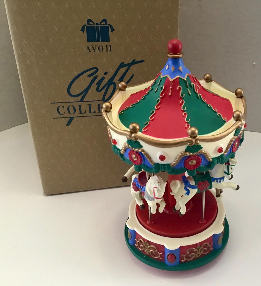 Avon Santa's Caroling Carousel - Christmas Music & Movement Merry Go ...