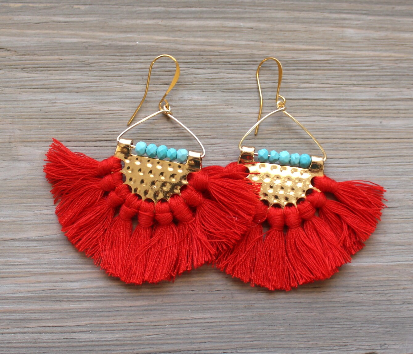 Red tiered store tassel earrings