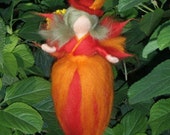 Carmina. Special fairy needle felted Waldorf. Orange and red merino wool.