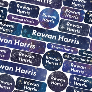 May include: A set of colourful, galaxy-themed name labels with the name "Rowan Harris" printed on them. The labels are ideal for school supplies, lunchboxes, or other personal items.