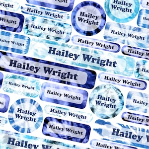 May include: A set of blue and white tie-dye personalized name labels with the name "Hailey Wright" printed on each label. The labels are in various shapes and sizes, including circles, rectangles, and ovals.
