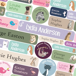 May include: A set of colourful personalised name labels with various animal illustrations. The labels feature names like Lydia Anderson, Louise White, Sophie Hughes, Alaina Chambers, George Easton, and Erin Brown. The labels are ideal for school supplies, lunchboxes, and other personal items.
