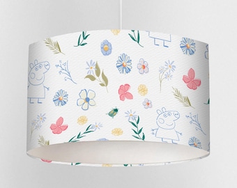 Pantalla de lámpara blanca con estampado floral de Peppa Pig, hecha a mano en el Reino Unido, ideal para habitaciones infantiles.
