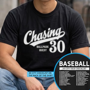 May include: A black short-sleeved t-shirt featuring white text that reads Chasing 30 Ballpark Quest. The shirt includes a graphic insert showing a Baseball 30 City Tour Checklist with a list of cities and states printed on the back of the garment.