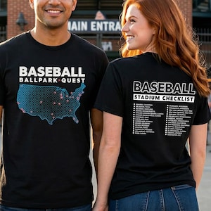 May include: Two black t-shirts featuring white text and graphics. The front displays BASEBALL BALLPARK QUEST with a dotted map of the United States marked with red stars. The back shows BASEBALL STADIUM CHECKLIST with a list of cities and states.
