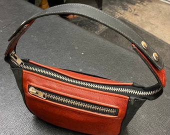 Duffle bag with black cow and red Kudo