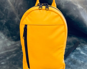 Yellow leather backpack