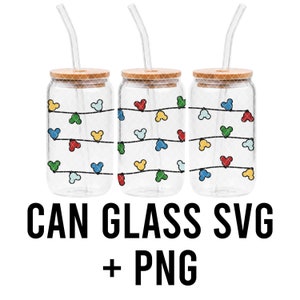 May include: Three clear glass can cups with bamboo lids and straws. Each cup features a design of colourful Mickey Mouse ears on a string of lights.