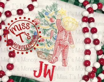 May include: White embroidered shirt with a red and green Christmas tree and a child putting a star on top. The shirt also has the text "Miss T's Monogram" and the initials "JW" in red.