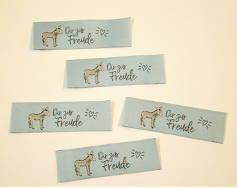 5 Woven label "Donkey - For your joy" 70 x20 mm prefolded