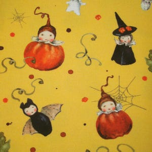 May include: A yellow fabric featuring a repeating pattern of small figures in Halloween costumes, including characters inside orange pumpkins, a black bat, a witch in a black hat, and a figure with a red mushroom cap, accented by spider webs.