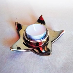 pottery star gold lustre tealight candleholderholder, gold star tealight candleholder, , gold glazed candle holder, gold tealight holder