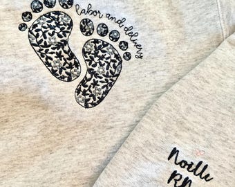 Baby Feet Embroidered Sweatshirt. Name and Title can be embroidered on the sleeve. Ideal for MotherBaby, L&D, NICU nurses,Midwives and MD's.