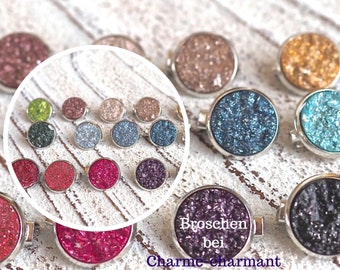 Brooch pink, green, black, silver, purple, turquoise.aqua gold,