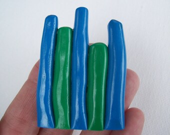 Green and blue clay vertical wave magnet