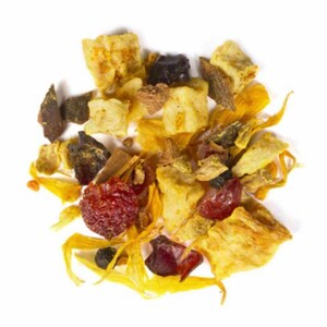 May include: A close-up of a pile of dried tea leaves and fruit pieces. The mix includes yellow, red, and brown pieces, with some yellow flower petals. The tea appears to be a blend of fruits and herbs.