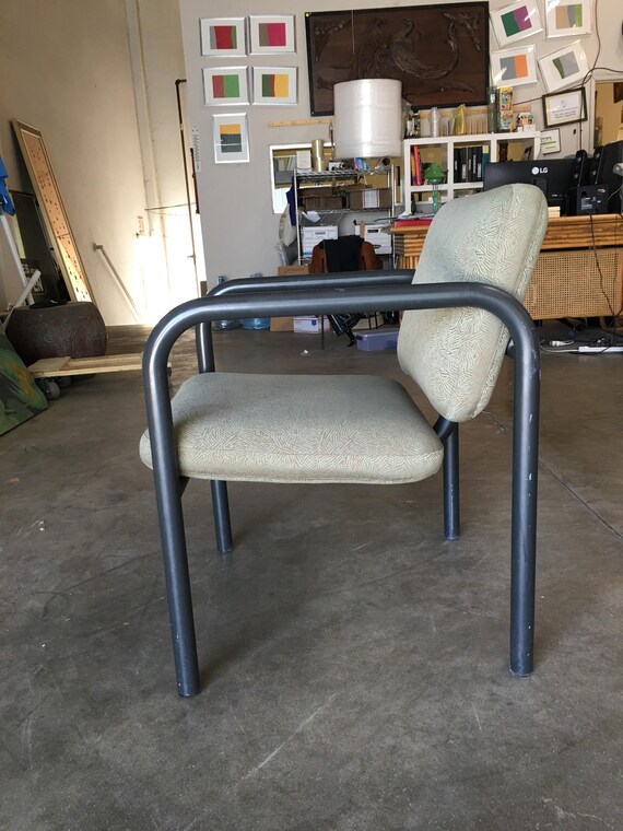 Tubular steel armchair deals