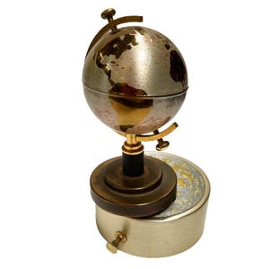 Mid-century Brass Spinning Music Box Globe Desktop Table Lighter
