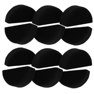 May include: Six black foam acoustic panels, each cut in half, for soundproofing a room.